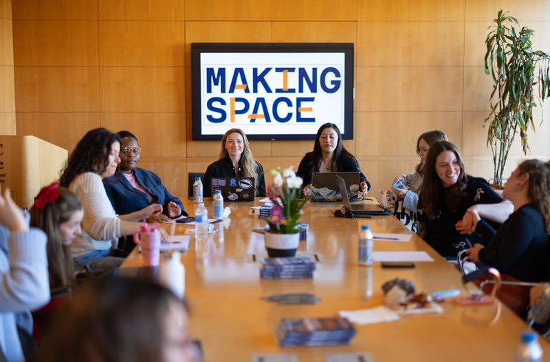 A team of Disabled professionals collaborating around a table